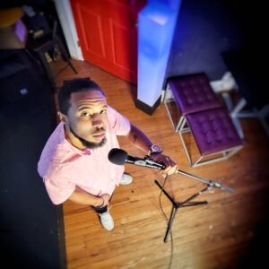 photoshoot of rapper holding microphone